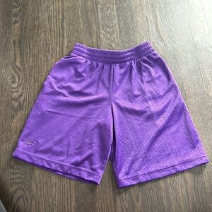 Purple starter shorts, size medium